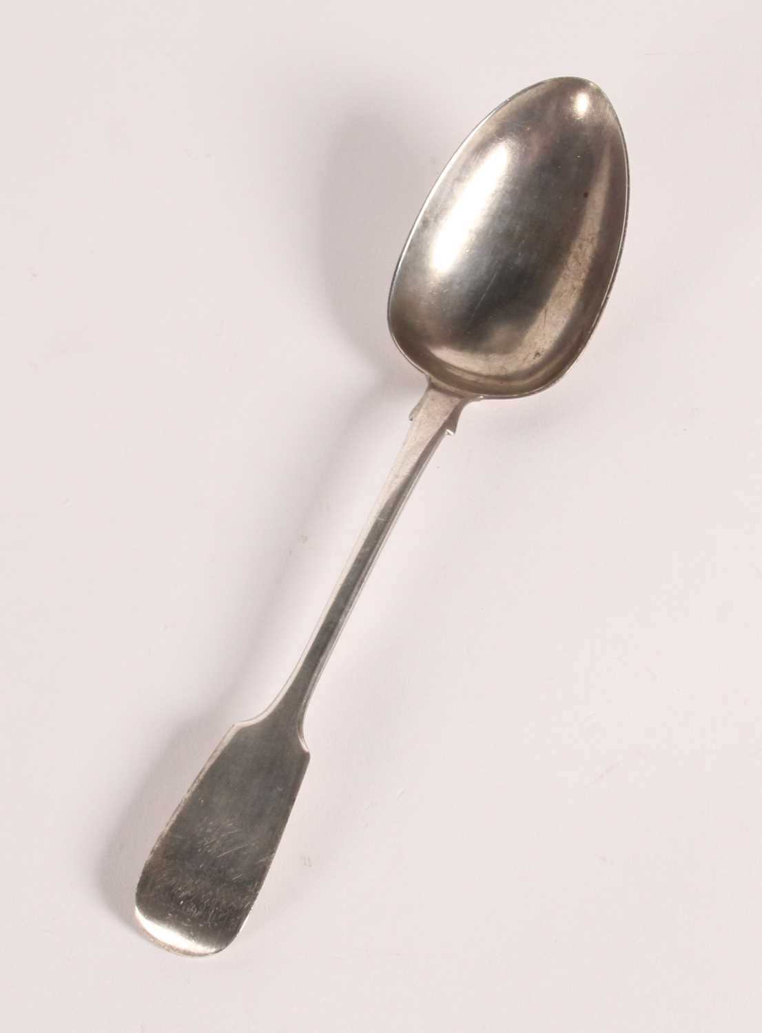 Lot 142 - A Victorian silver fiddle pattern table spoon,...