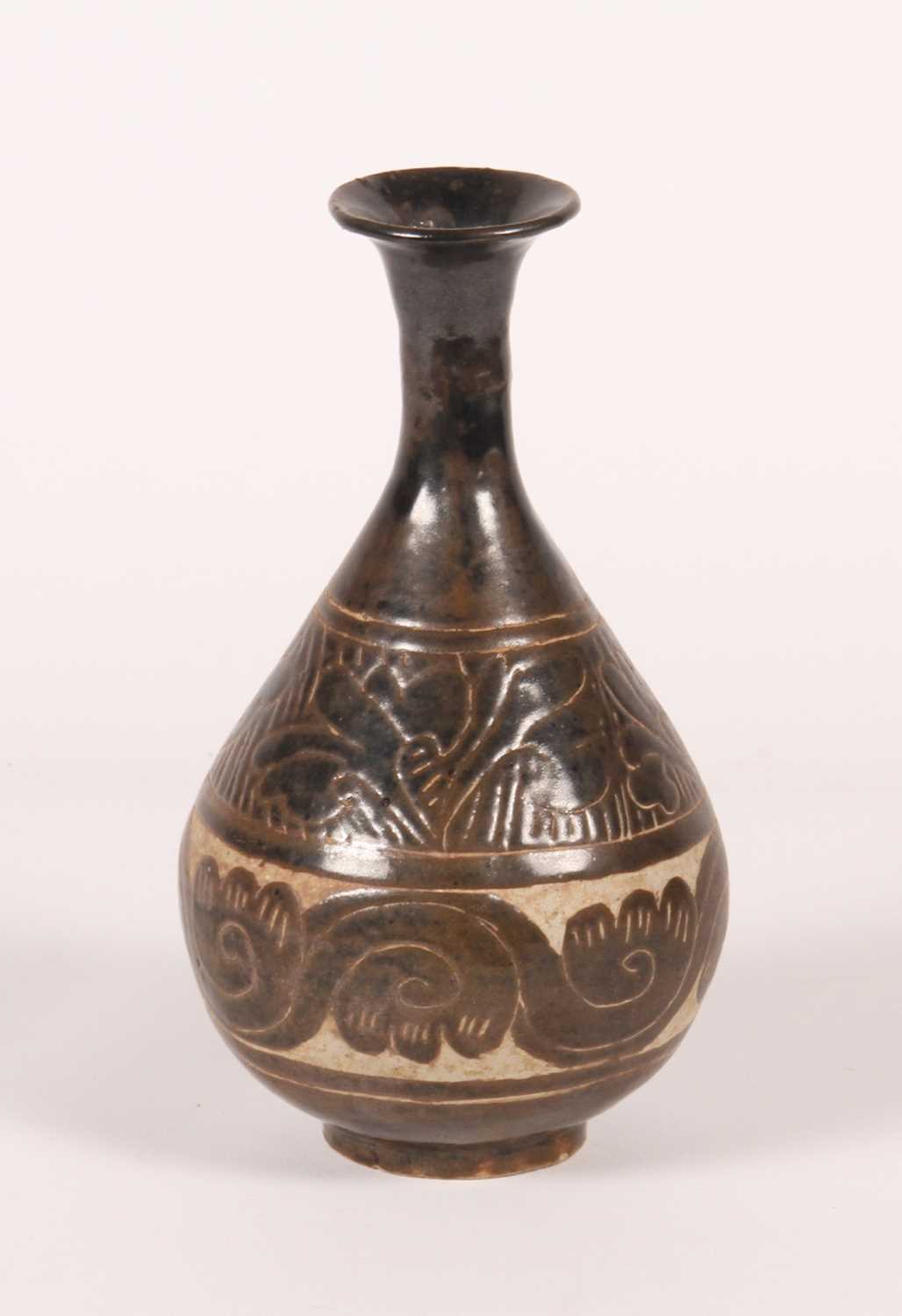 Lot 74 - A Chinese cizhou type earthenware vase, having...
