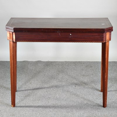 Lot 520 - A George III mahogany and strung folding card...