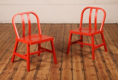 Lot 440 - A set of five red painted Saw dining chairs,...