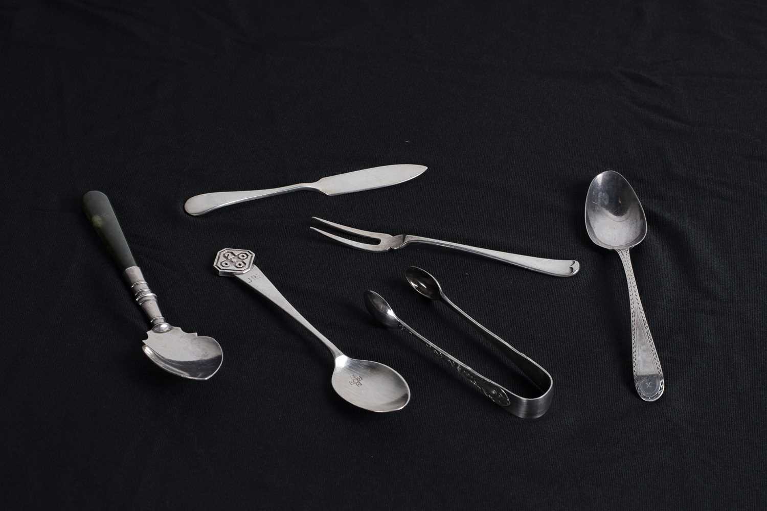 Lot 135 - A collection of mixed silver flatwares, 80g gross