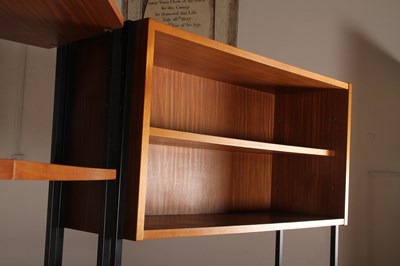 Lot 64 - A Ladderax teak corner unit, 1970s, having...