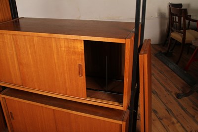 Lot 64 - A Ladderax teak corner unit, 1970s, having...