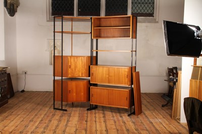 Lot 64 - A Ladderax teak corner unit, 1970s, having...