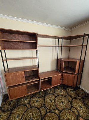 Lot 64 - A Ladderax teak corner unit, 1970s, having...