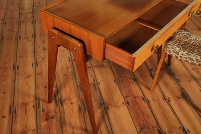Lot 79 - A Berick teak desk, mid 20th century, having a...