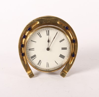 Lot 229 - A brass stirrup clock, 19th century, the...