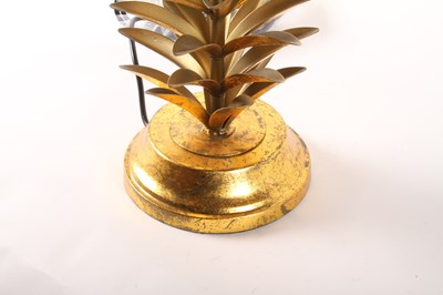 Lot 36 - A gilt metal table lamp, in the form of a palm...