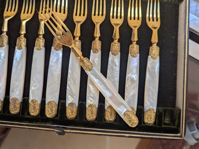 Lot 134 - A set of twelve French silver gilt bladed...