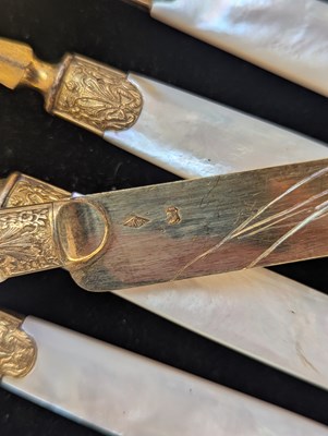 Lot 134 - A set of twelve French silver gilt bladed...