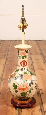 Lot 416 - A Chinese porcelain table lamp, of baluster...