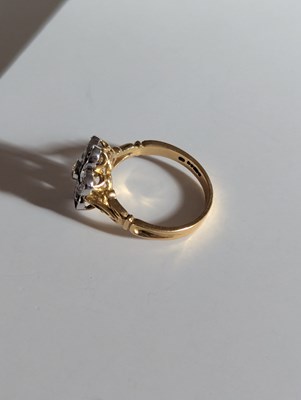 Lot 113 - An 18ct yellow gold blue and yellow sapphire...