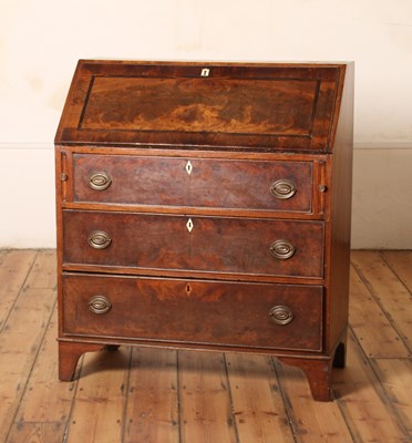 Lot 429 - A 19th century mahogany bureau, having ivory...