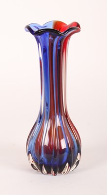 Lot 113 - A blue and red art glass vase, 20th century,...