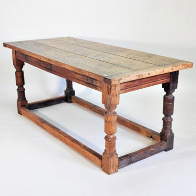 Lot 666 - An 18th century oak refectory dining table,...