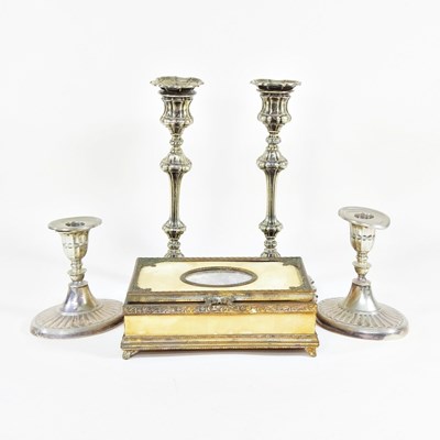 Lot 16 - A pair of silver plated table candlesticks,...