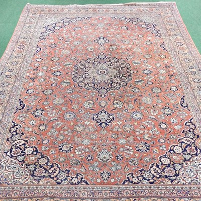 Lot 216 - A large Persian carpet, early to mid 20th...