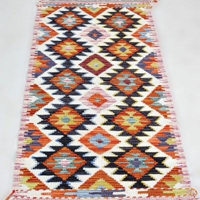 Lot 86 - A Persian kilim runner, 143 x 60cm
