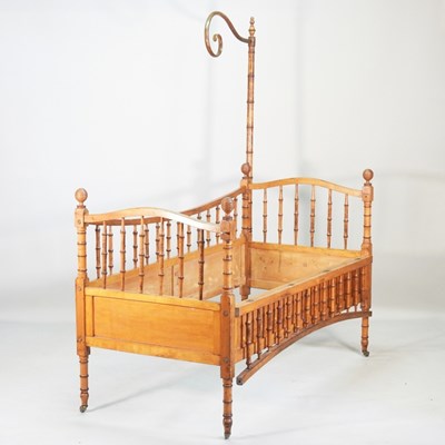Lot 212 - A Victorian faux bamboo child's cot, on castors