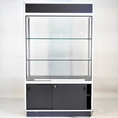 Lot 393 - A modern glazed shop display cabinet, with...