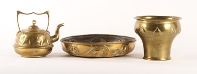 Lot 73 - An Art Nouveau repousse decorated brass...