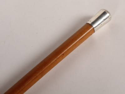 Lot 208 - A silver handled walking stick, having a...