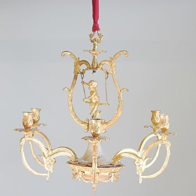 Lot 127 - A continental gilt metal six branch chandelier,...