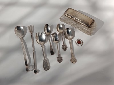 Lot 218 - A collection of silver forks and spoons, with...