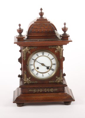Lot 363 - An early 20th century walnut cased mantel...