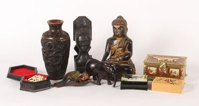 Lot 258 - A collection of mainly Asian carved items,...