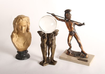 Lot 330 - A brass figure group supporting a crystal ball,...