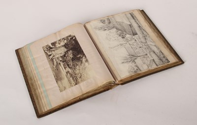Lot 321 - A Victorian album of early photographs,...