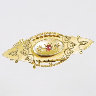Lot 31 - An early 20th century 9 carat gold, ruby and...
