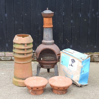 Lot 472 - A chiminea, 112cm high, together with a...