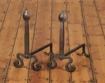 Lot 93 - A pair of Arts and Crafts style wrought iron...