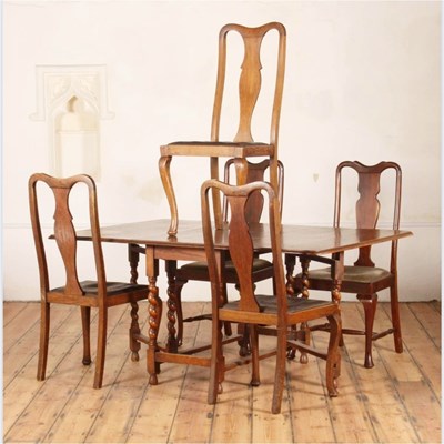 Lot 586 - A 1920s oak gateleg dining table, 164cm wide...