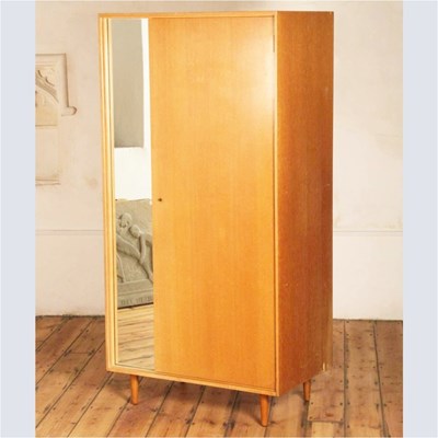 Lot 560 - A 1960s Stag single wardrobe, with an inset...