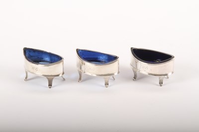 Lot 210 - Three navette-shaped silver salts with blue...