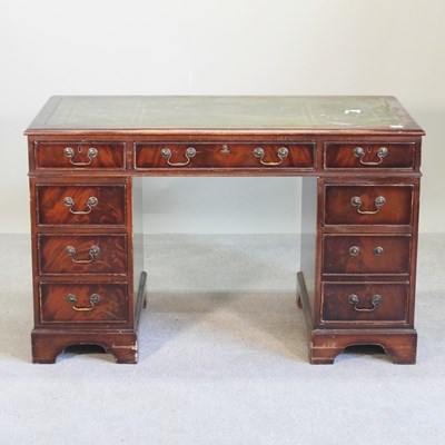 Lot 478 - A reproduction mahogany pedestal desk, with an...