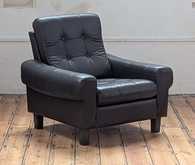 Lot 24 - A Danish brown button upholstered leather...