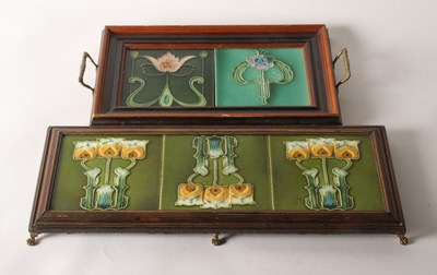 Lot 94 - A set of three Art Nouveau glazed tiles,...