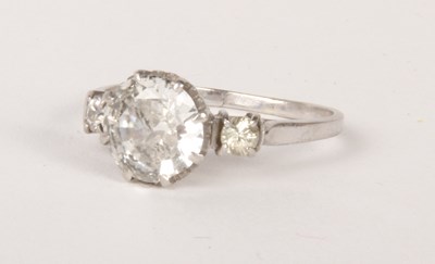 Lot 203 - A platinum diamond three stone ring,...
