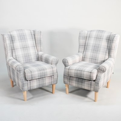 Lot 480 - A pair of modern check upholstered wing...