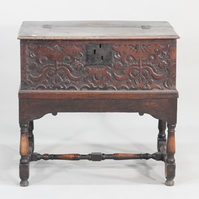 Lot 370 - An 18th century carved oak Bible box, with a...