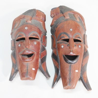 Lot 40 - Two similar large African carved hardwood...