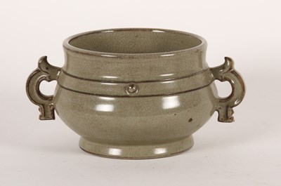 Lot 246 - A Chinese crackle celadon glazed squat vase,...
