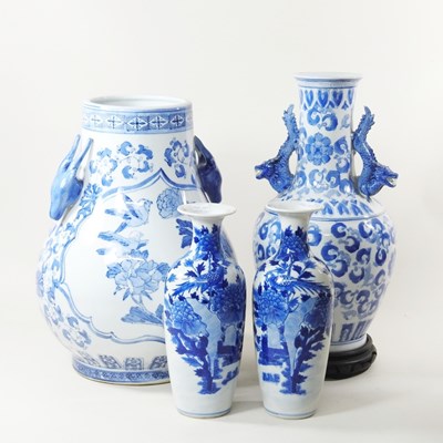 Lot 110 - A pair of Chinese vases, together with two...