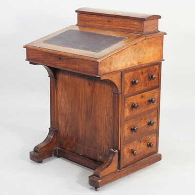 Lot 320 - A Victorian walnut davenport, with a bird's...