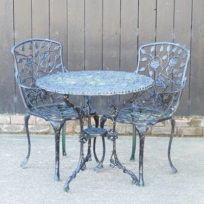 Lot 447 - A garden table, 79cm wide, together with two...