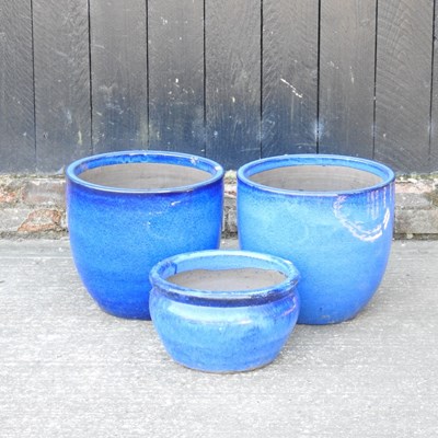 Lot 275 - A pair of blue glazed garden pots, 36cm high,...